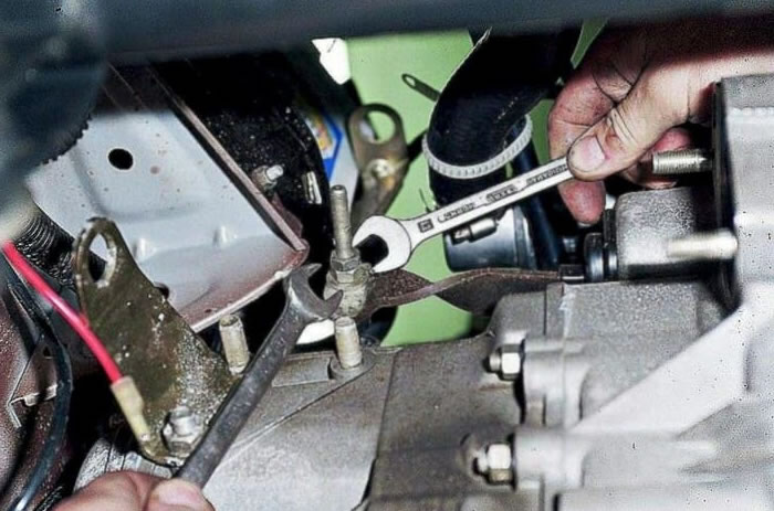 How is the clutch cable adjusted