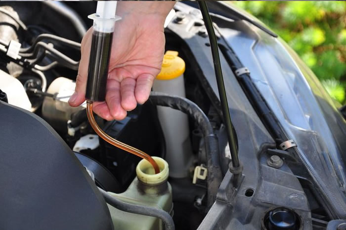 replacing power steering fluid